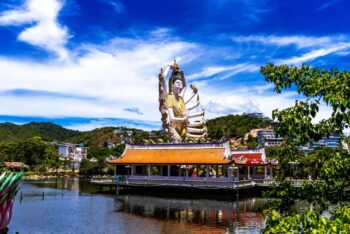 Wat Plai Laem Samui temple complex colorful architecture lake