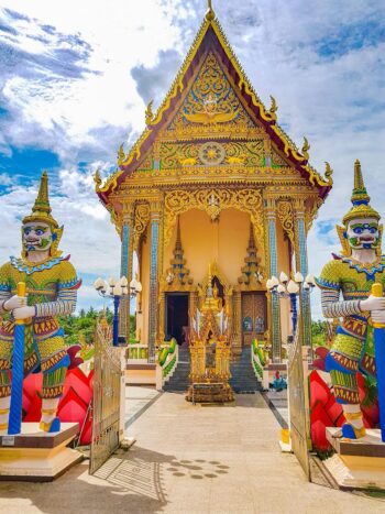 Wat Plai Laem Samui temple complex colorful architecture lake